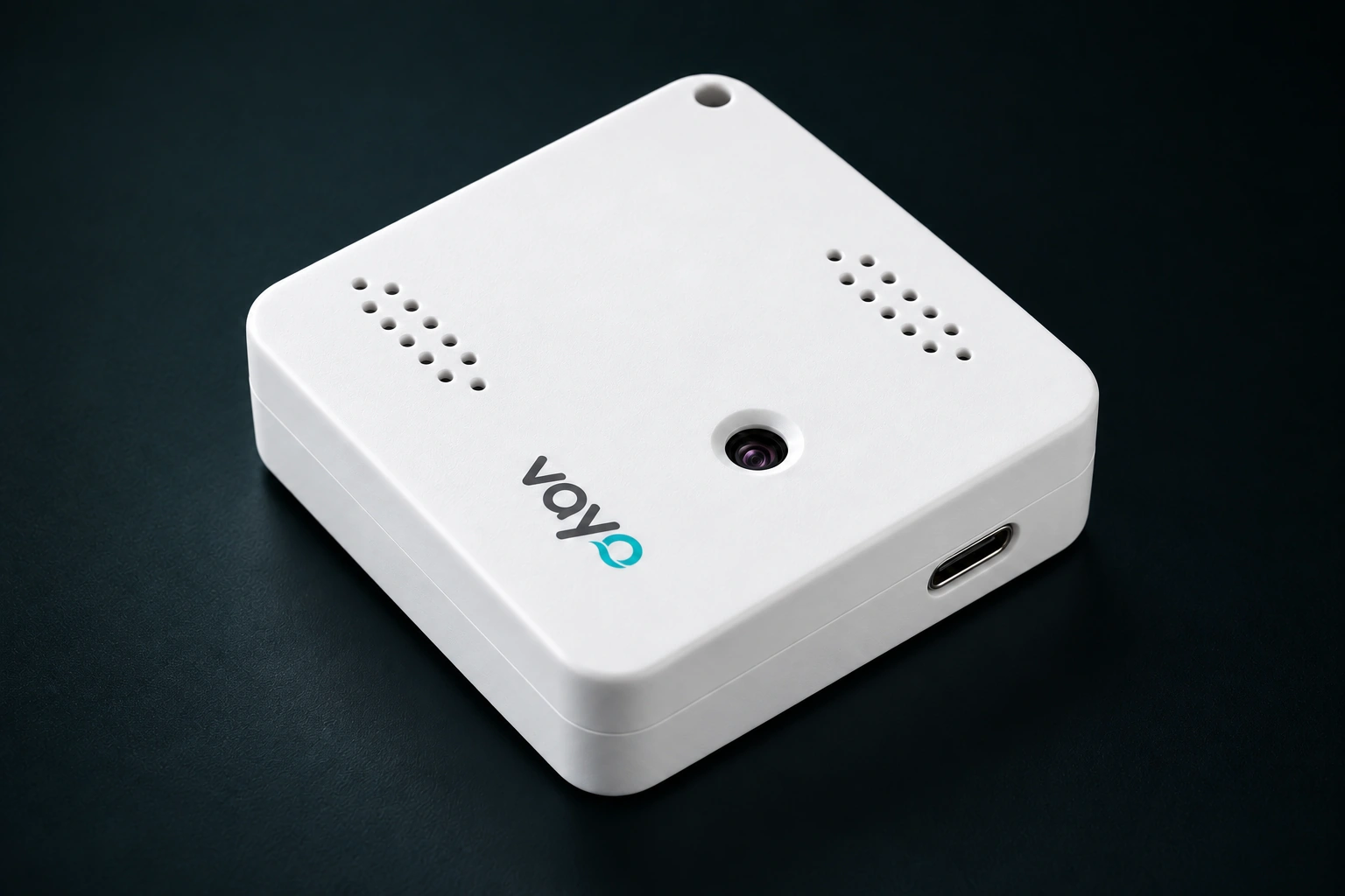 White Vayo One with its laser sensor lens, ventilation holes and teal logo